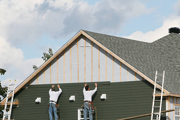 Professional Siding technician working in Argyle, TX